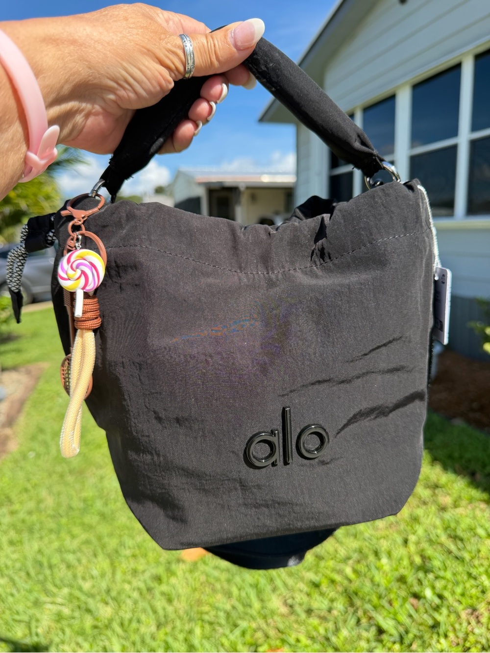 ALO Yoga Black Drawstring Mini Bucket Bag with Candy Charm - Picture 6 of 16